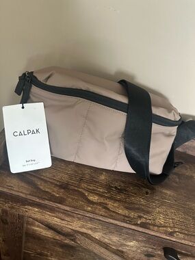 CALPAK Taupe Belt Bag with Black Strap